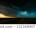 Moody colorful storm clouds drifting overhead 132168907