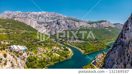 Breathtaking high angle view of the emerald green Cetina River flowing through a majestic rocky gorge 132169587