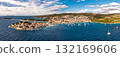 Amazing bird eye perspective of historic Primosten old town peninsula and Rogoznica harbor in Adriatic Croatia 132169606