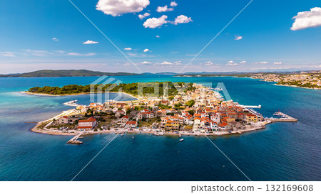 Spectacular aerial view of Primosten old town peninsula surrounded by crystal turquoise Adriatic Sea in Croatia Spectacular aerial view of Primosten old town peninsula surrounded by crystal turquoise Adriatic Sea in Croatia 132169608