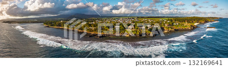 Gris Gris Mauritius aerial view with breaking waves over coral reef black rock headlands lighthouse and green shoreline Gris Gris Mauritius aerial view with breaking waves over coral reef black rock headlands lighthouse and green shoreline 132169641