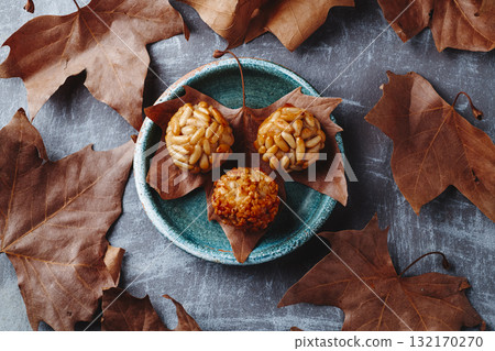 Catalan panellets with pine nuts and almonds Catalan panellets with pine nuts and almonds 132170270