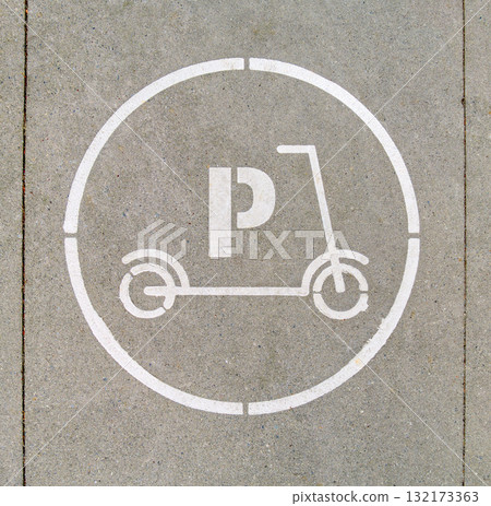 Electric scooter parking stall sign on concrete pavement surface Electric scooter parking stall sign on concrete pavement surface 132173363