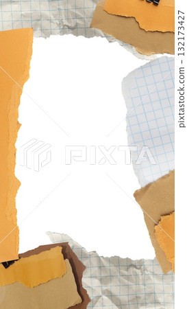 Frame of torn piece of brown and yellow piece of paper with beige tape and black binder isolated on white background 132173427