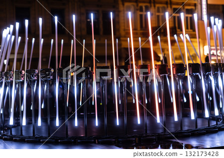 The fascinating night scene captures a modern light installation that dominates the space with a futuristic aesthetic and consists  132173428