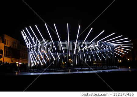 The fascinating night scene captures a modern light installation that dominates the space with a futuristic aesthetic and consists  132173436