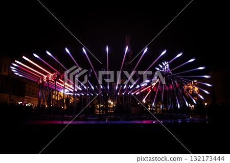 The fascinating night scene captures a modern light installation that dominates the space with a futuristic aesthetic and consists  132173444