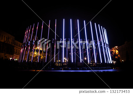 The fascinating night scene captures a modern light installation that dominates the space with a futuristic aesthetic and consists  132173453