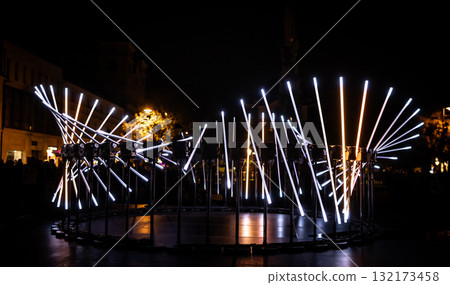 The fascinating night scene captures a modern light installation that dominates the space with a futuristic aesthetic and consists  132173458