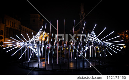 The fascinating night scene captures a modern light installation that dominates the space with a futuristic aesthetic and consists  132173460