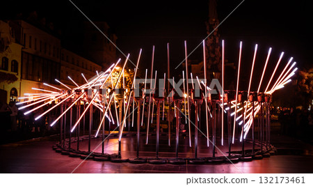 The fascinating night scene captures a modern light installation that dominates the space with a futuristic aesthetic and consists  132173461
