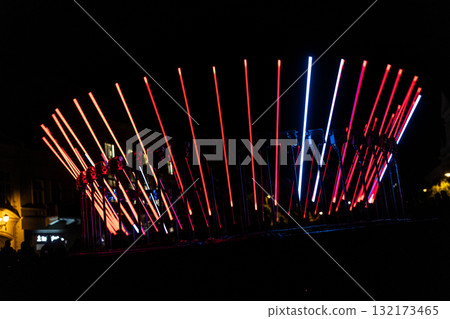 The fascinating night scene captures a modern light installation that dominates the space with a futuristic aesthetic and consists  132173465