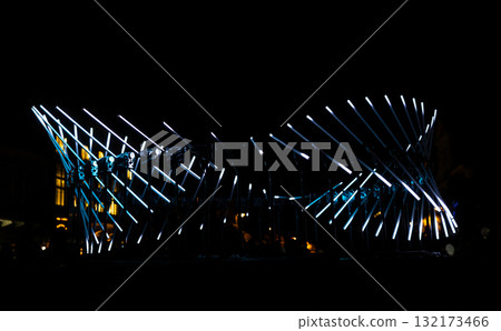 The fascinating night scene captures a modern light installation that dominates the space with a futuristic aesthetic and consists  132173466