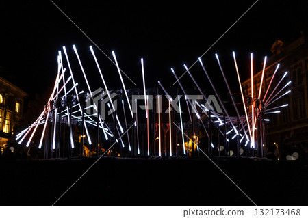 The fascinating night scene captures a modern light installation that dominates the space with a futuristic aesthetic and consists  132173468