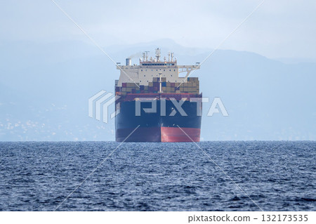 big container ship prow frontal view in the sea big container ship prow frontal view in the sea 132173535