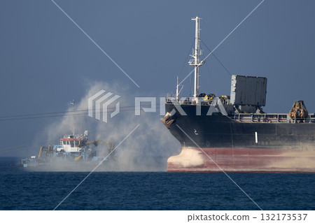 Ships working building genoa new breakwater in front of the harbor 132173537