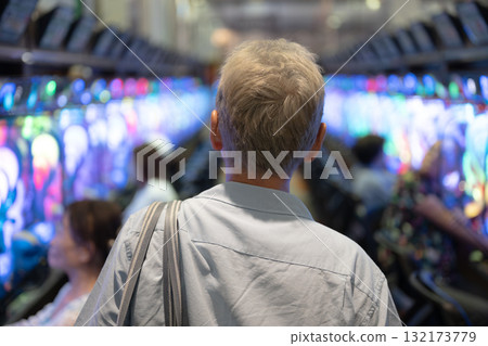 Men enjoying pachinko 132173779