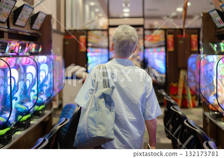 Men enjoying pachinko 132173781