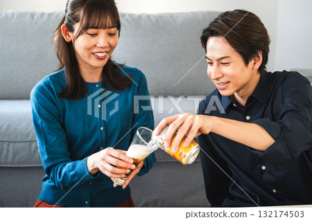 A woman poured beer 132174503