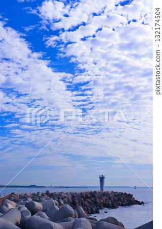 Sheep clouds and the Oiso Lighthouse floating in the autumn blue sky Sheep clouds and the Oiso Lighthouse floating in the autumn blue sky 132174504