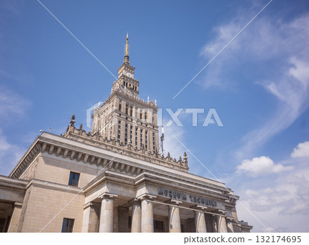 [Poland] The historic exterior of the Palace of Culture and Science in the capital, Warsaw, and the blue sky 132174695