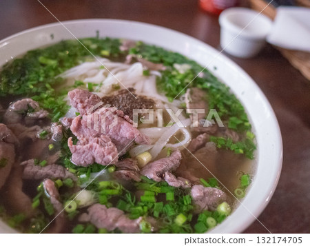 [Poland] Pho on a table at a Vietnamese restaurant in downtown Warsaw 132174705