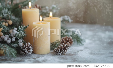 Three lit candles with winter decorations on snowy background. Christmas craft activity, creative DIY project for kids, decor and craftwork, eco friendly, sustainable concept. 132175420