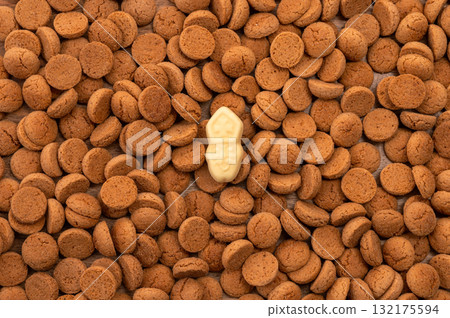Background Dutch holiday Sinterklaas with copy space for text. Kruidnoten cookies and traditional hollands sweets. 132175594