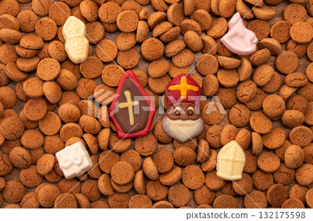 Background Dutch holiday Sinterklaas with copy space for text. Kruidnoten cookies and traditional hollands sweets. Background Dutch holiday Sinterklaas with copy space for text. Kruidnoten cookies and traditional hollands sweets. 132175598