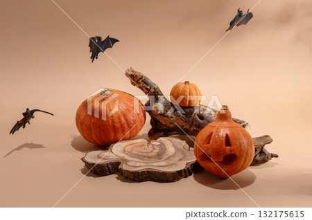 Empty wooden log on table with pumpkin and bats. Halloween or Thanksgiving mock up for products. 132175615