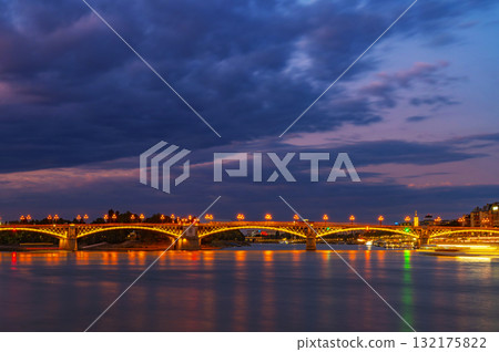 Evening photo shows the Margaret Bridge in Budapest, Hungary Evening photo shows the Margaret Bridge in Budapest, Hungary 132175822