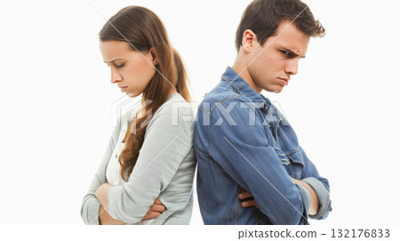 Tense couple standing back to back with serious expressions. Concept conflict, divorce, misunderstanding in family. Tense couple standing back to back with serious expressions. Concept conflict, divorce, misunderstanding in family. 132176833