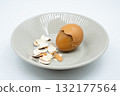 Boiled eggs in a circular bowl on a white background 132177564