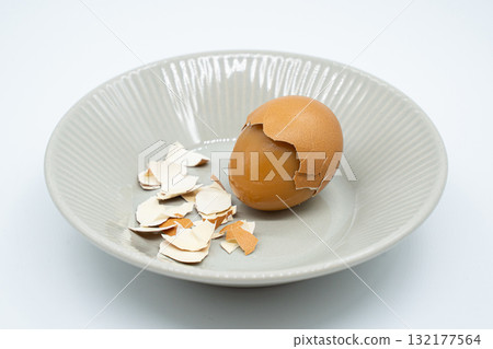 Boiled eggs in a circular bowl on a white background Boiled eggs in a circular bowl on a white background 132177564