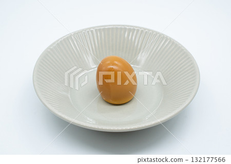 Boiled eggs in a circular bowl on a white background 132177566