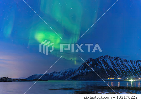 Lofoten Norway, aurora borealis northern lights winter landscape at Gimsoysand Lofoten Norway, aurora borealis northern lights winter landscape at Gimsoysand 132178222