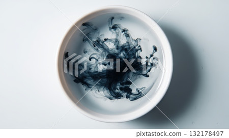 Blue Ink Swirl In White Bowl Creates Abstract Water Art For Creative Backgrounds Blue Ink Swirl In White Bowl Creates Abstract Water Art For Creative Backgrounds 132178497