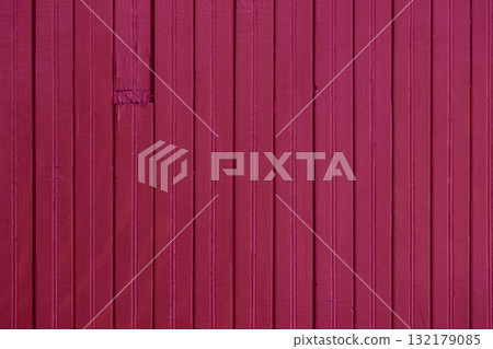 Vertical wooden planks painted vibrant magenta create bold geometric texture and strong visual rhythm. Concept of magenta wood texture, color of season, colorful design background Vertical wooden planks painted vibrant magenta create bold geometric texture and strong visual rhythm. Concept of magenta wood texture, color of season, colorful design background 132179085