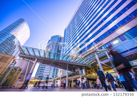 Tokyo cityscape in Japan: View of Shinagawa Station bustling with foreign tourists and office buildings 132179330