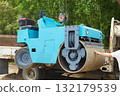 Mounting a compact roller on a truck for transportation to a construction site 132179539