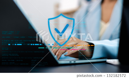 Cybersecurity and Data Protection Concept with Shield Icon on Laptop Screen 132182572