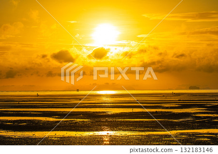 the sun in golden sky Over the lighthouse 132183146