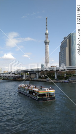 Skytree and sightseeing boats seen from the Sumida River Skytree and sightseeing boats seen from the Sumida River 132184602