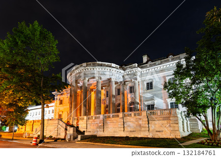 Nighttime view of Memorial Continental Hall in Washington, D.C., United States, featuring its neoclassical facade and grand columns lit under dramatic lighting Nighttime view of Memorial Continental Hall in Washington, D.C., United States, featuring its neoclassical facade and grand columns lit under dramatic lighting 132184761