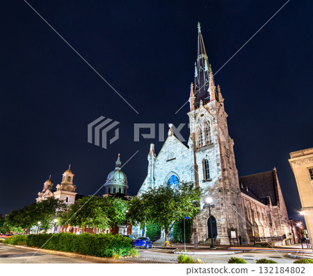 Grace United Methodist Church in Harrisburg, Pennsylvania, USA. The Gothic Revival landmark and nearby St. Patrick's Cathedral are illuminated at night Grace United Methodist Church in Harrisburg, Pennsylvania, USA. The Gothic Revival landmark and nearby St. Patrick's Cathedral are illuminated at night 132184802