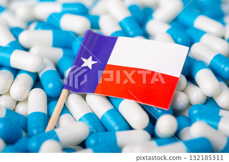 Flag of Texas on pile of pills. Epidemic in the US state concept Flag of Texas on pile of pills. Epidemic in the US state concept 132185311