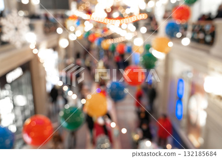 Blurred Christmas background with colorful decorations and soft focus copy space for design Blurred Christmas background with colorful decorations and soft focus copy space for design 132185684