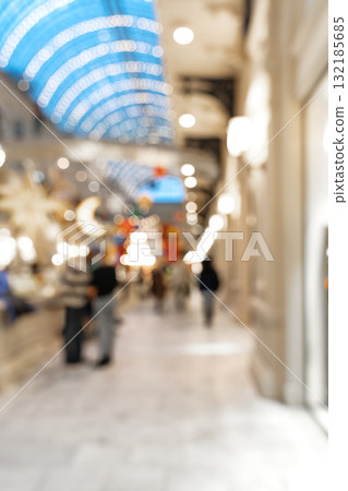Blurred Christmas background with soft focus and vibrant lights, ideal for festive copy space Blurred Christmas background with soft focus and vibrant lights, ideal for festive copy space 132185685