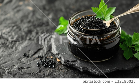 Black Caviar in Glass Jar with Silver Spoon Black Caviar in Glass Jar with Silver Spoon 132186025