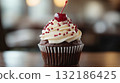 Deliciously decorated cupcake with a cherry on top 132186425